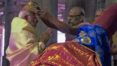 The priests of the temple specially greeted PM Modi with welcome slogans written in Sanskrit on the road, announcing his arrival. (ANI ) The priests of the temple specially greeted PM Modi with welcome slogans written in Sanskrit on the road, announcing his arrival. (ANI )