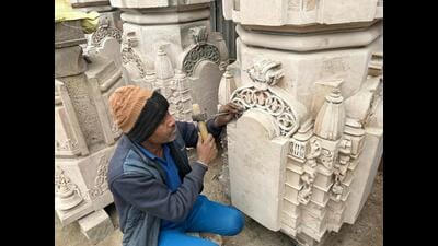 Devi Lal Dabar, an artisan from Rajasthan, giving final touches to a ‘Shila’ to be shifted to the site of Ram temple. (HT Photo) Devi Lal Dabar, an artisan from Rajasthan, giving final touches to a ‘Shila’ to be shifted to the site of Ram temple. (HT Photo)