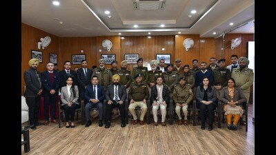Director general of police Praveer Ranjan and Judicial Academy director Ajay Kumar presided over the function, along with officers of Central Detective Training Institute, Judicial Academy and Chandigarh Police. (HT Photo)