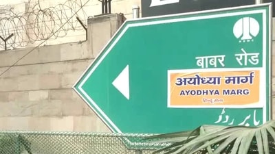 Hindu Sena activists pasted stickers of Ayodhya Marg on Babar Road signboards (X)