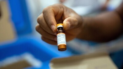 FILE PHOTO: A vial of measles vaccine is checked at a field logistics base. REUTERS/Hereward Holland/File Photo (REUTERS)