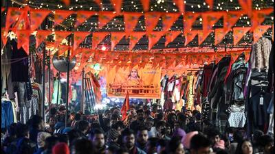 Janpath Market in Delhi decorated with flags ahead of the consecration ceremony at Ayodhya. (Raj K Raj/HT Photo) Janpath Market in Delhi decorated with flags ahead of the consecration ceremony at Ayodhya. (Raj K Raj/HT Photo)