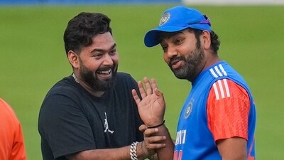 India's Rishabh Pant joins team captain Rohit Sharma after the former's net practice as part of his rehabilitation programme, during team India's practice session ahead of the third T20 cricket match between India and Afghanistan (PTI) India's Rishabh Pant joins team captain Rohit Sharma after the former's net practice as part of his rehabilitation programme, during team India's practice session ahead of the third T20 cricket match between India and Afghanistan (PTI)