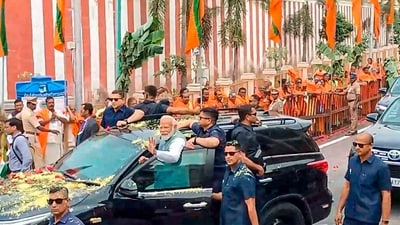 Upon his arrival at the temple, PM Modi was greeted by a huge crowd that had gathered along his route. He acknowledged the crowd by waving to them from his vehicle. (PTI) Upon his arrival at the temple, PM Modi was greeted by a huge crowd that had gathered along his route. He acknowledged the crowd by waving to them from his vehicle. (PTI)
