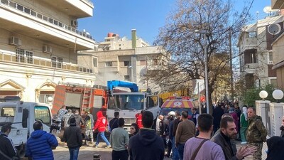 Israel strikes in Damascus: People gather near the damaged site, that was hit by an Israeli military strike according to sources, in Damascus. (Reuters)