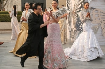 Suneet Varma takes a bow after his fashion showcase at DLF Emporio.
