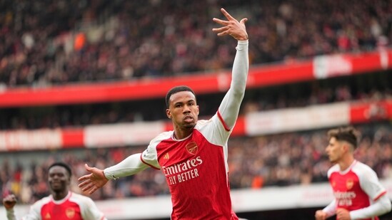 Arsenal's Gabriel, centre, celebrates after scoring his side's opening goal (AP)
