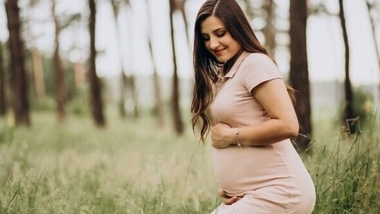 8. Eases back pain: Many pregnant women experience back pain due to the added weight and changes in posture. Walking, with proper form, can help alleviate back pain and strengthen core muscles.&nbsp;(Freepik)