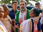 Congress leader Rahul Gandhi embraces a woman during the party's Bharat Jodo Nyay Yatra, in Majuli.