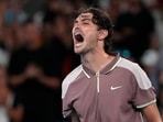 Taylor Fritz of the U.S. celebrates after defeating Stefanos Tsitsipas of Greece in their fourth round match at the Australian Open tennis championships at Melbourne Park, Melbourne, Australia, Sunday, Jan. 21