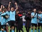 Bayer Leverkusen's players celebrate after the German first division Bundesliga football match between RB Leipzig and Bayer Leverkusen in Leipzig on January 20