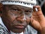 a member of the Ramnami religious movement with tattoos of Hindu god Ram's name on his body