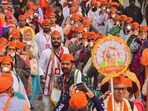 Members of Vishva Hindu Parishad take part in a procession in Prayagraj on January 20, ahead of the consecration ceremony of Ayodhya's Ram temple.