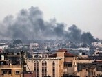 A picture taken from Rafah shows smoke billowing over Khan Yunis in the southern Gaza Strip during Israeli bombardment A picture taken from Rafah shows smoke billowing over Khan Yunis in the southern Gaza Strip during Israeli bombardment