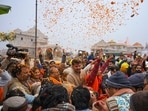 Devotees during the performance of daily puja, 'havan' and 'parayana' in the pavilion ahead of the consecration ceremony of Ram Temple, in Ayodhya. Devotees during the performance of daily puja, 'havan' and 'parayana' in the pavilion ahead of the consecration ceremony of Ram Temple, in Ayodhya.