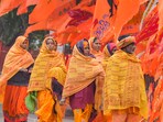 Devotees arrive at a Sarayu ghat, ahead of Ram temple consecration ceremony, in Ayodhya Devotees arrive at a Sarayu ghat, ahead of Ram temple consecration ceremony, in Ayodhya