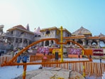Ayodhya: Ram Temple being decorated with flowers on the eve of its consecration ceremony, in Ayodhya, Sunday. (PTI) Ayodhya: Ram Temple being decorated with flowers on the eve of its consecration ceremony, in Ayodhya, Sunday. (PTI)