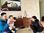 Pooja Matta with her husband and daughter.