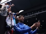 Serbia's Novak Djokovic takes selfies for fans after a victory against France's Adrian Mannarino during their men's singles match on day eight of the Australian Open tennis tournament in Melbourne on January 21 Serbia's Novak Djokovic takes selfies for fans after a victory against France's Adrian Mannarino during their men's singles match on day eight of the Australian Open tennis tournament in Melbourne on January 21