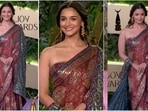 the red carpet in elegant ajrakh printed saree with modern drape