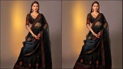 On Saturday, Aditi gave her fans a weekend surprise as the actress took to Instagram and uploaded a series of stunning pictures. In the post, Aditi can be seen looking like an elegant princess in a black lehenga ensemble. Her post quickly went viral on social media and garnered tons of likes and comments from her adoring followers. (Instagram/@aditiraohydari) On Saturday, Aditi gave her fans a weekend surprise as the actress took to Instagram and uploaded a series of stunning pictures. In the post, Aditi can be seen looking like an elegant princess in a black lehenga ensemble. Her post quickly went viral on social media and garnered tons of likes and comments from her adoring followers. (Instagram/@aditiraohydari)