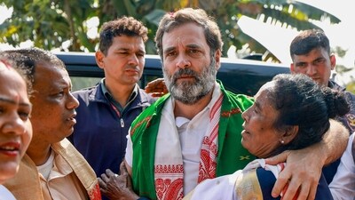 Congress leader Rahul Gandhi embraces a woman during the party's Bharat Jodo Nyay Yatra, in Majuli.