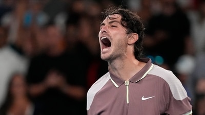 Taylor Fritz of the U.S. celebrates after defeating Stefanos Tsitsipas of Greece in their fourth round match at the Australian Open tennis championships at Melbourne Park, Melbourne, Australia, Sunday, Jan. 21 (AP) Taylor Fritz of the U.S. celebrates after defeating Stefanos Tsitsipas of Greece in their fourth round match at the Australian Open tennis championships at Melbourne Park, Melbourne, Australia, Sunday, Jan. 21 (AP)