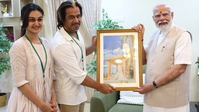 Aishwarya and Arjun met PM Modi in Chennai Aishwarya and Arjun met PM Modi in Chennai