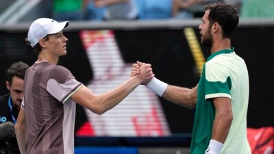 Jannik Sinner, left, of Italy is congratulated by Karen Khachanov of Russia following their fourth round match at the Australian Open tennis championships at Melbourne Park (AP) Jannik Sinner, left, of Italy is congratulated by Karen Khachanov of Russia following their fourth round match at the Australian Open tennis championships at Melbourne Park (AP)