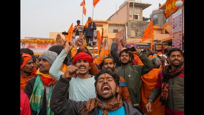Devotees dancing at Hanuman Garhi Temple ahead of the consecration ceremony of Ram Mandir, in Ayodhya, Sunday. (PTI) Devotees dancing at Hanuman Garhi Temple ahead of the consecration ceremony of Ram Mandir, in Ayodhya, Sunday. (PTI)