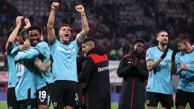 Bayer Leverkusen's players celebrate after the German first division Bundesliga football match between RB Leipzig and Bayer Leverkusen in Leipzig on January 20 (AFP) Bayer Leverkusen's players celebrate after the German first division Bundesliga football match between RB Leipzig and Bayer Leverkusen in Leipzig on January 20 (AFP)