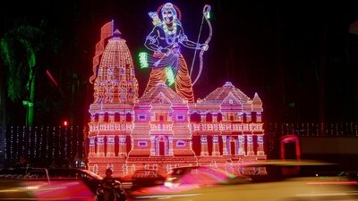 Traffic moves past a decorative lighting of Lord Ram on a street in Mumbai. (REUTERS)