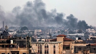 A picture taken from Rafah shows smoke billowing over Khan Yunis in the southern Gaza Strip during Israeli bombardment (AFP) A picture taken from Rafah shows smoke billowing over Khan Yunis in the southern Gaza Strip during Israeli bombardment (AFP)