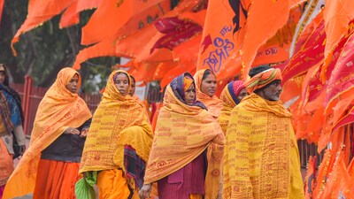 Devotees arrive at a Sarayu ghat, ahead of Ram temple consecration ceremony, in Ayodhya (PTI)