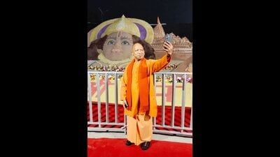 Uttar Pradesh chief minister Yogi Adityanath takes selfies at the Ram Temple premises on the eve of its 'Pran Pratishtha' ceremony, in Ayodhya, Sunday. (PTI) Uttar Pradesh chief minister Yogi Adityanath takes selfies at the Ram Temple premises on the eve of its 'Pran Pratishtha' ceremony, in Ayodhya, Sunday. (PTI)