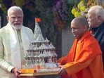 Prime Minister Narendra Modi being felicitated by Uttar Pradesh chief minister Yogi Adityanath in the presence of RSS chief Mohan Bhagwat during the 'Pran Pratishtha' ceremony of the Ram Janmabhoomi Temple in Ayodhya on Monday. Prime Minister Narendra Modi being felicitated by Uttar Pradesh chief minister Yogi Adityanath in the presence of RSS chief Mohan Bhagwat during the 'Pran Pratishtha' ceremony of the Ram Janmabhoomi Temple in Ayodhya on Monday.