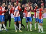 Girona's Uruguayan forward #07 Cristhian Stuani and teammates celebrate their victory at the end of the Spanish League football match between Girona FC and Sevilla FC Girona's Uruguayan forward #07 Cristhian Stuani and teammates celebrate their victory at the end of the Spanish League football match between Girona FC and Sevilla FC