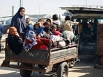 Palestinians fleeing Khan Younis, due to the Israeli ground operation, amid the ongoing conflict between Israel and the Palestinian Islamist group Hamas, arrive in Rafah in the southern Gaza Strip, January 22, 2024. REUTERS/Ibraheem Abu Mustafa