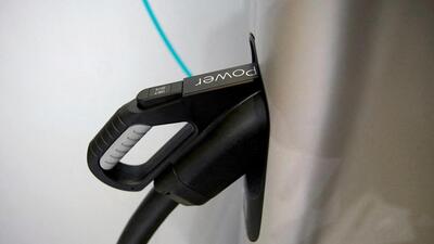 A charging plug is seen on an electric vehicle (REUTERS FILE/REPRESENTATIVE IMAGE) A charging plug is seen on an electric vehicle (REUTERS FILE/REPRESENTATIVE IMAGE)