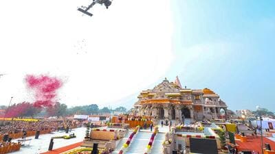 A helicopter showers flowers during the Ram Mandir Pran Pratishtha ceremony in Ayodhya. (PTI) A helicopter showers flowers during the Ram Mandir Pran Pratishtha ceremony in Ayodhya. (PTI)