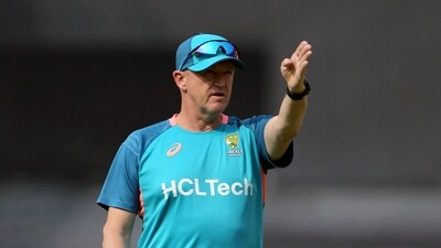 Andy Flower inspects the pitch during a practice session (ANI)