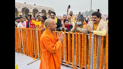 Chief minister Yogi Adityanath greets guests at the Concecration ceremony in Ayodhya on Monday. (Agency) Chief minister Yogi Adityanath greets guests at the Concecration ceremony in Ayodhya on Monday. (Agency)