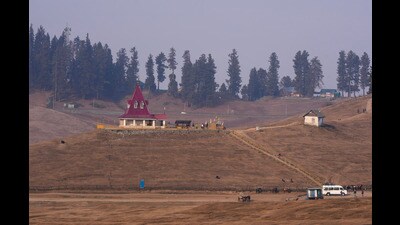 Deserted ski resort at Gulmarg, in Baramulla district, on Sunday. The forests of Jammu and Kashmir have been declared highly vulnerable to the effects of unpredictable weather patterns, early springs and above average temperatures which experts have attributed to climate change and global warming. (PTI) Deserted ski resort at Gulmarg, in Baramulla district, on Sunday. The forests of Jammu and Kashmir have been declared highly vulnerable to the effects of unpredictable weather patterns, early springs and above average temperatures which experts have attributed to climate change and global warming. (PTI)