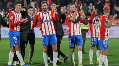 Girona's Uruguayan forward #07 Cristhian Stuani and teammates celebrate their victory at the end of the Spanish League football match between Girona FC and Sevilla FC (AFP) Girona's Uruguayan forward #07 Cristhian Stuani and teammates celebrate their victory at the end of the Spanish League football match between Girona FC and Sevilla FC (AFP)
