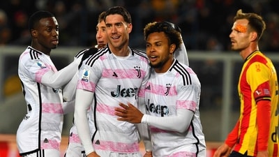 Juventus' players Dusan Vlahovic, center left, and Weston McKennie, right, celebrate the team's goal during the Italian Serie A soccer match between Lecce and Juventus at the Via del Mare Stadium in Lecce, Italy, Sunday, Jan. 21 (AP)