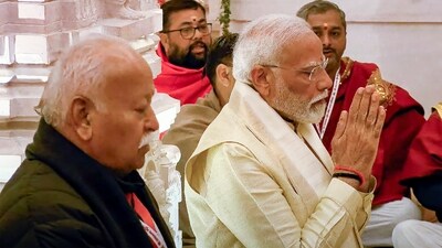 PM Modi with Rashtriya Swayamsevak Sangh (RSS) chief Mohan Bhagwat during the 'Pran Pratishtha' ceremony at the Ram Mandir in Ayodhya. (PTI) PM Modi with Rashtriya Swayamsevak Sangh (RSS) chief Mohan Bhagwat during the 'Pran Pratishtha' ceremony at the Ram Mandir in Ayodhya. (PTI)