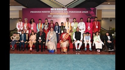 President Droupadi Murmu with awardees at Bal Puraskar event in New Delhi on Monday. (HT Photo)
