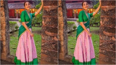 Her outfit features a green V-neck blouse with elbow-length sleeves. She paired it with a pastel pink lehenga skirt with enchanting green borders and detailing at the waist, showing the perfect example of stylish colour blocking. (Instagram/@hegdepooja) Her outfit features a green V-neck blouse with elbow-length sleeves. She paired it with a pastel pink lehenga skirt with enchanting green borders and detailing at the waist, showing the perfect example of stylish colour blocking. (Instagram/@hegdepooja)