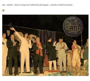 Amitabh was seen waving while holding a mic.