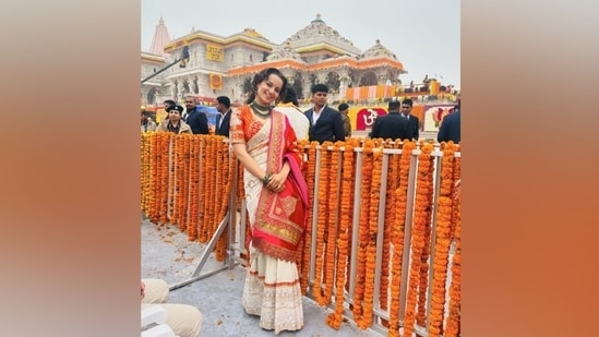 Kangana wore a traditional saree for the special occasion. Her ensemble comes in an ivory hue and is decked with intricate embroidery done in vibrant red, orange, and gold shades. The six yards feature broad patti borders, dori work, and gota patti embellishments. Kangana wore the drape traditionally, letting the pallu fall from her shoulder and neat pleats on the front.&nbsp;(Instagram)